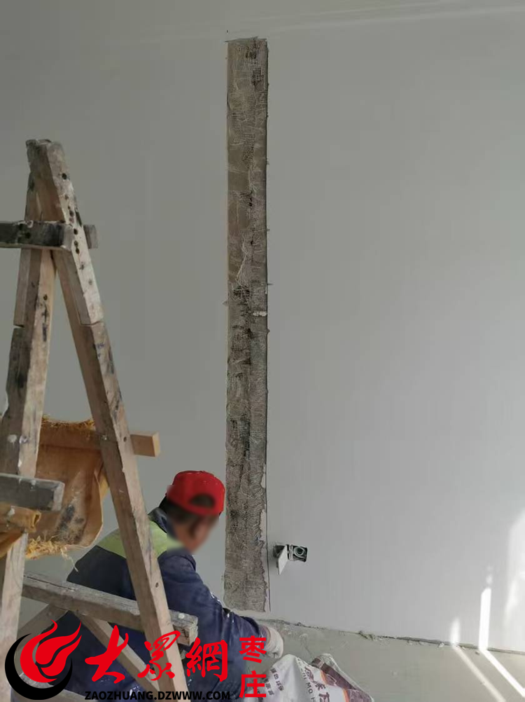 春风海棠小区房屋内墙体反复开裂业主装修损失与开发商存分歧